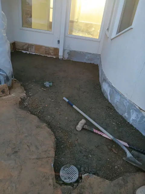 Base and drain set before the flagstone goes down