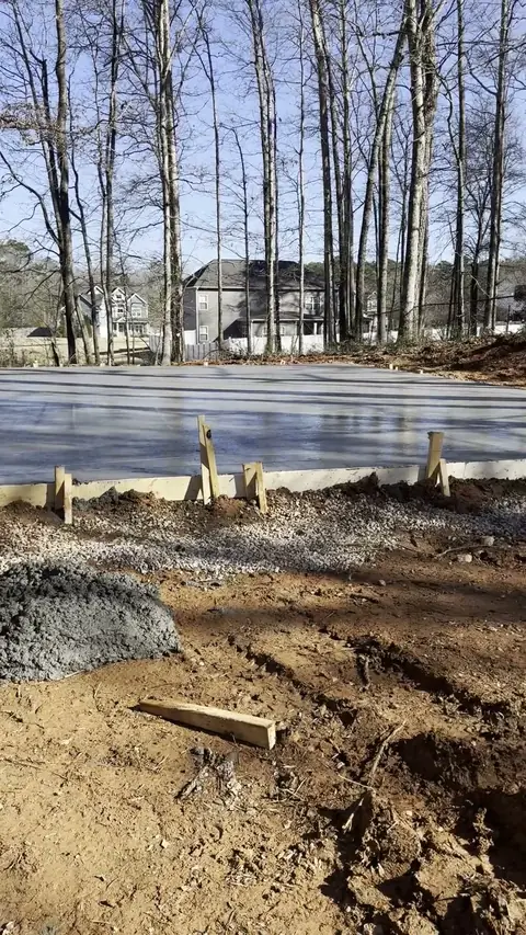 Concrete slab poured on a cleared lot