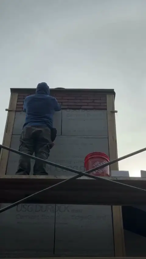 Chimney and exterior rebuild from scaffolding